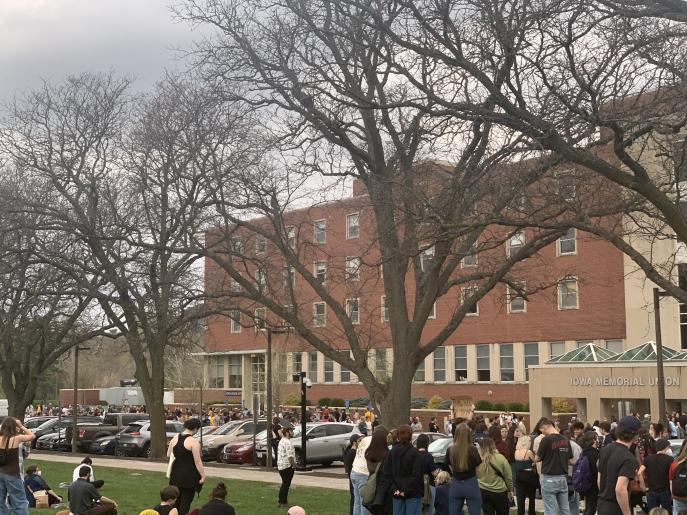 Group of protestors amass outside Iowa Memorial Union