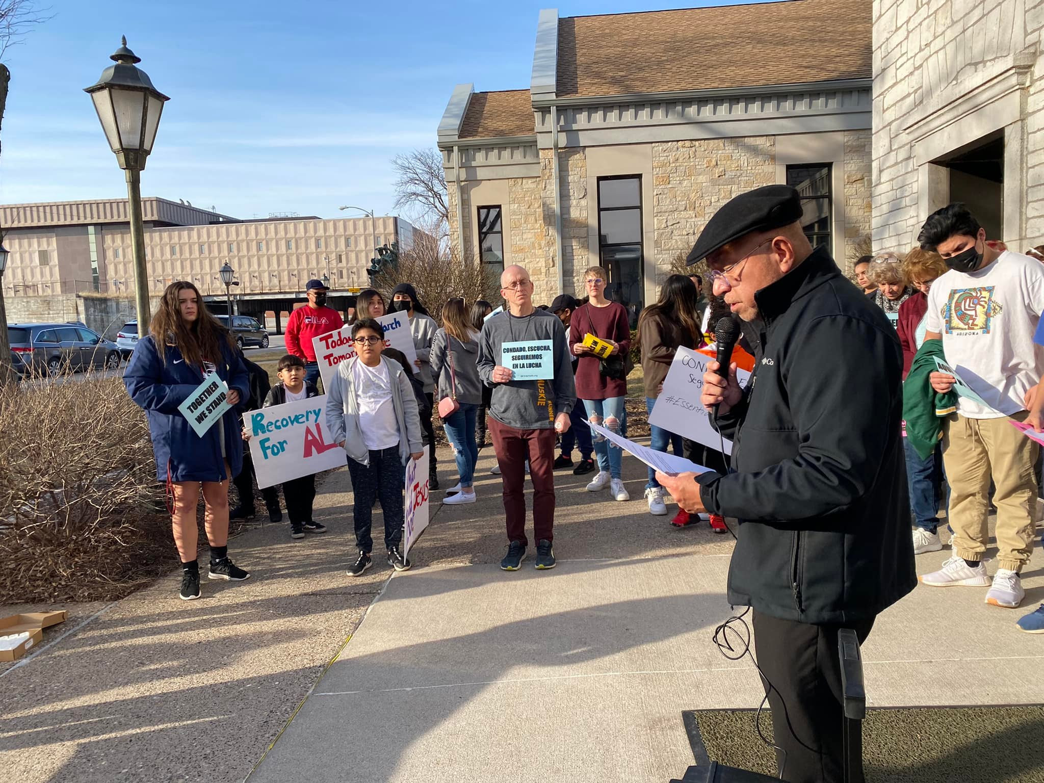 Pastor Rudy of Davenport's St. Anthony Parish speaking against the Juvenile Detention Center expansion at a rally of essential workers